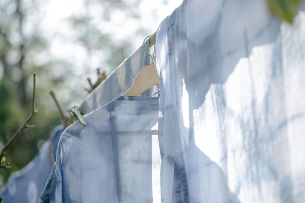 Freshly laundered clothes hanging outside - Caribbean Cleaning Srq